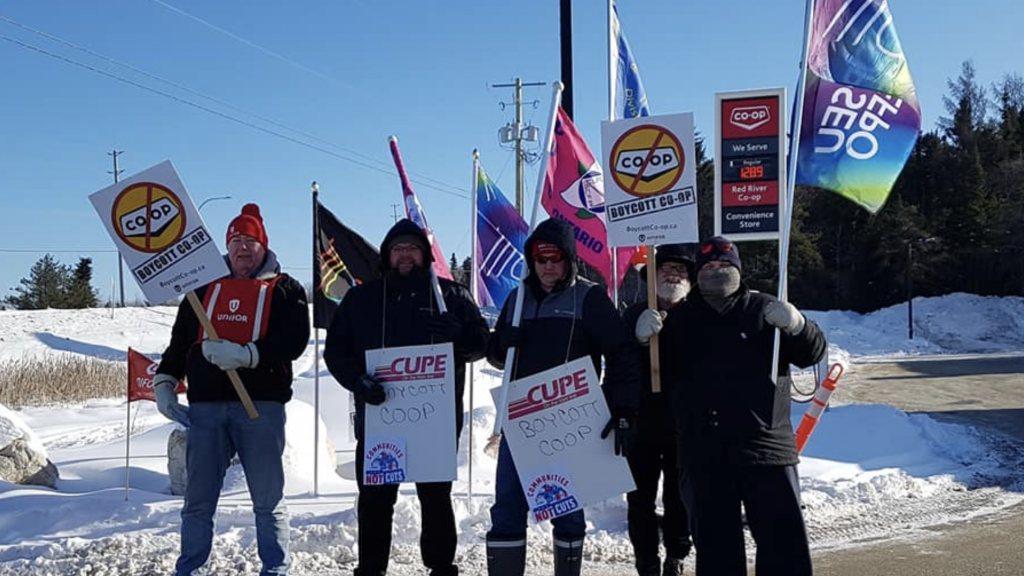 Union members holding placards